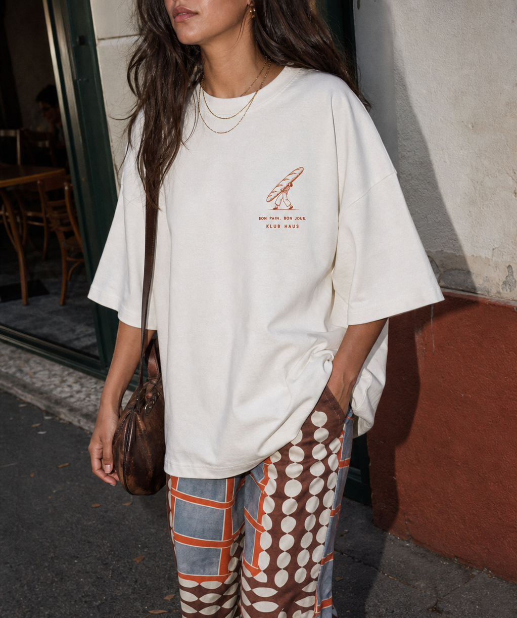 Baguette Club Natural Raw oversized T-shirt, front view showing the small rust chest print