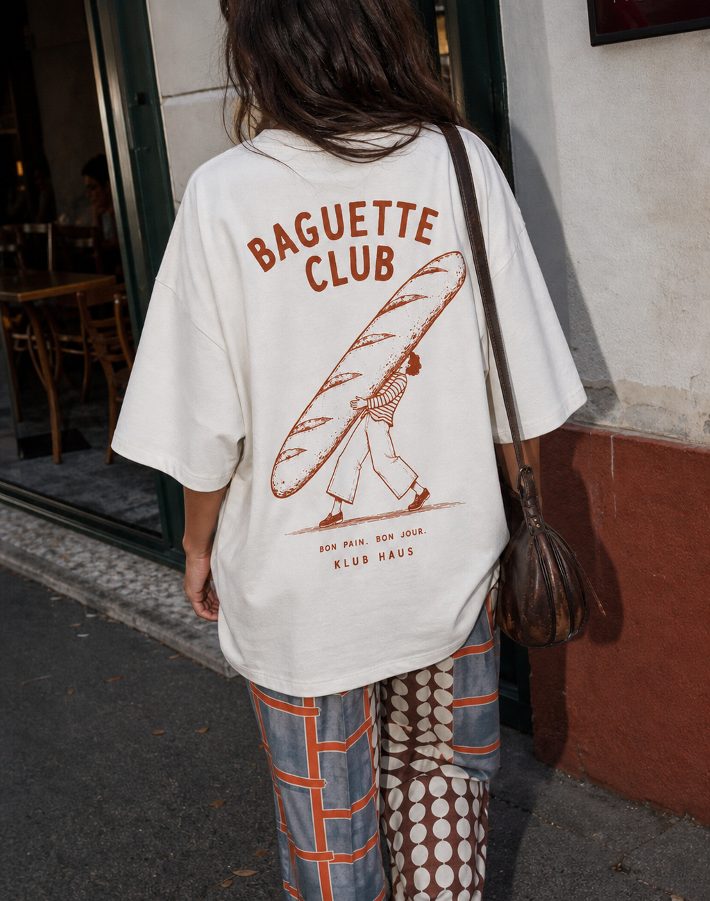 Baguette Club Natural Raw oversized T-shirt, model wearing the large rust illustrated back print